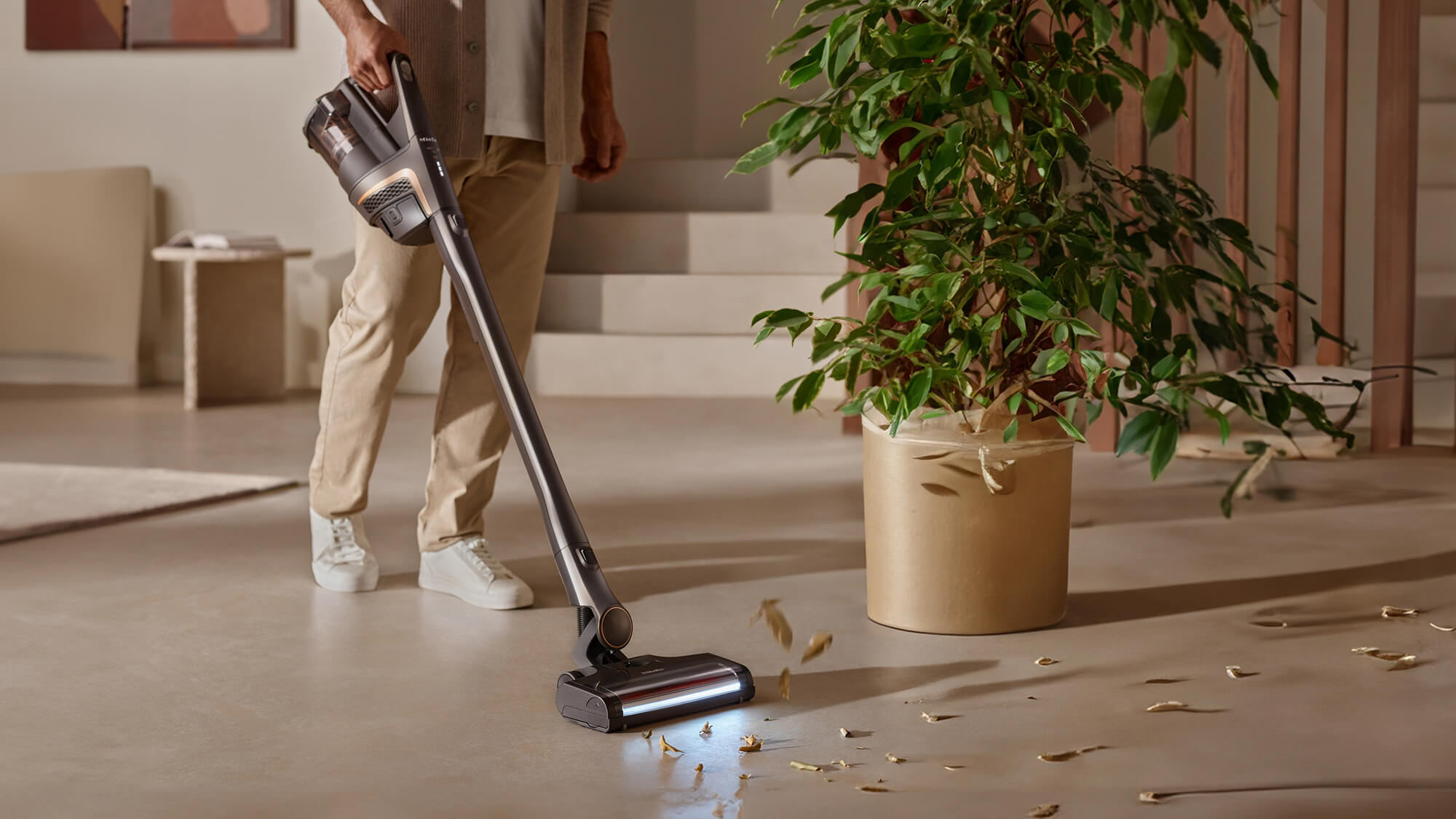TriflexHX2 Man using Triflex HX2 vacuum to clean up fallen plant leaves
